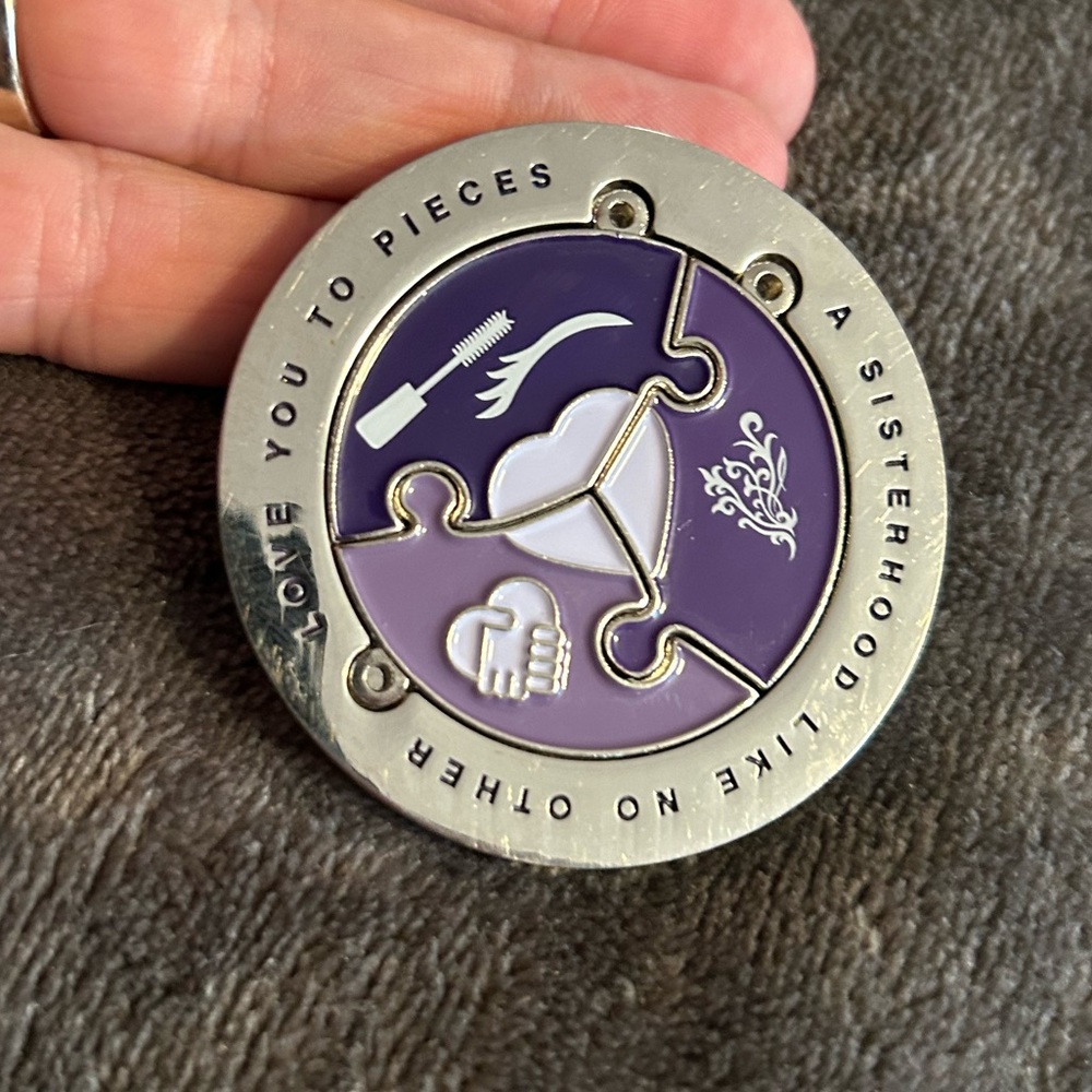 Younique “Love you to pieces” charm.